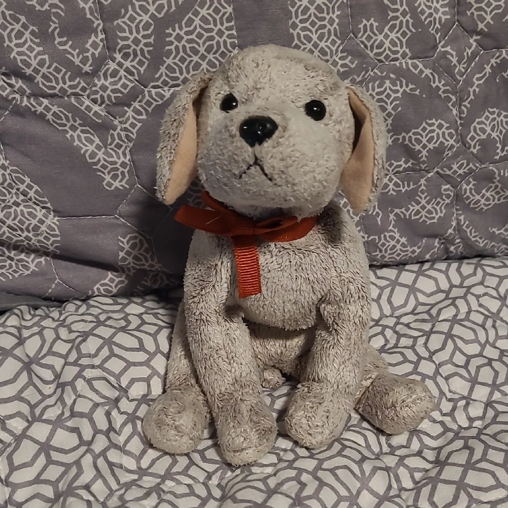 Plush Dog Toy with Red Bow